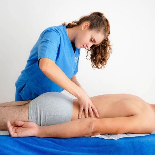 osteopathic therapy Calgary session for lower back pain at La Vita Osteo